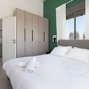 דירת גן שהפכה לדירת אירוח צבעונית 12